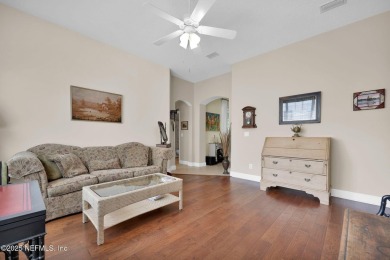 This elegant David Weekley home offers panoramic water views on The Palencia Club in Florida - for sale on GolfHomes.com, golf home, golf lot