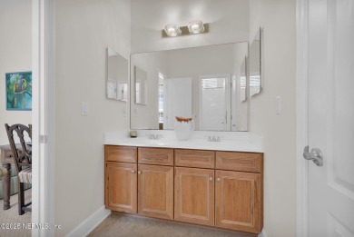 This elegant David Weekley home offers panoramic water views on The Palencia Club in Florida - for sale on GolfHomes.com, golf home, golf lot