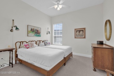 This elegant David Weekley home offers panoramic water views on The Palencia Club in Florida - for sale on GolfHomes.com, golf home, golf lot