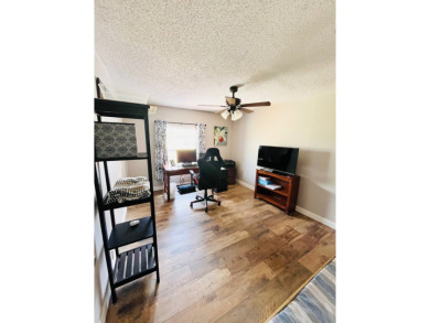 This stunning two-bedroom, two-bathroom home in Pine Lakes on Pine Lakes Country Club in Florida - for sale on GolfHomes.com, golf home, golf lot