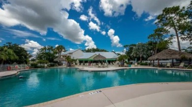 This stunning two-bedroom, two-bathroom home in Pine Lakes on Pine Lakes Country Club in Florida - for sale on GolfHomes.com, golf home, golf lot