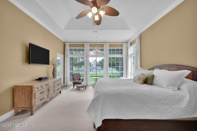 This elegant David Weekley home offers panoramic water views on The Palencia Club in Florida - for sale on GolfHomes.com, golf home, golf lot