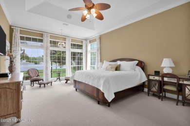 This elegant David Weekley home offers panoramic water views on The Palencia Club in Florida - for sale on GolfHomes.com, golf home, golf lot