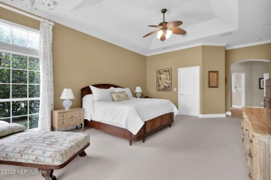 This elegant David Weekley home offers panoramic water views on The Palencia Club in Florida - for sale on GolfHomes.com, golf home, golf lot