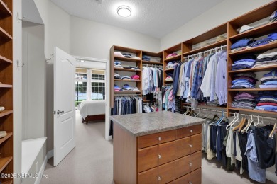 This elegant David Weekley home offers panoramic water views on The Palencia Club in Florida - for sale on GolfHomes.com, golf home, golf lot