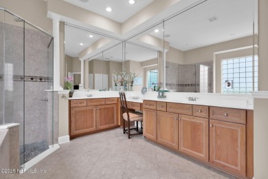 This elegant David Weekley home offers panoramic water views on The Palencia Club in Florida - for sale on GolfHomes.com, golf home, golf lot