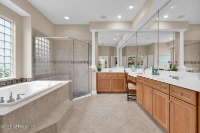 This elegant David Weekley home offers panoramic water views on The Palencia Club in Florida - for sale on GolfHomes.com, golf home, golf lot