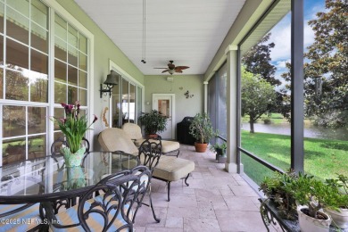 This elegant David Weekley home offers panoramic water views on The Palencia Club in Florida - for sale on GolfHomes.com, golf home, golf lot