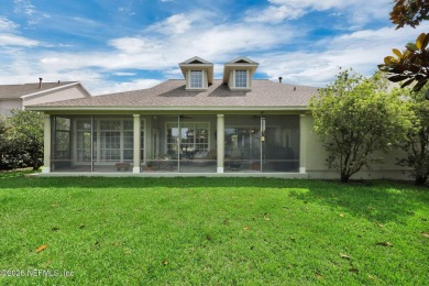 This elegant David Weekley home offers panoramic water views on The Palencia Club in Florida - for sale on GolfHomes.com, golf home, golf lot