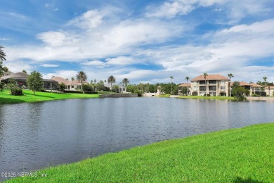 This elegant David Weekley home offers panoramic water views on The Palencia Club in Florida - for sale on GolfHomes.com, golf home, golf lot
