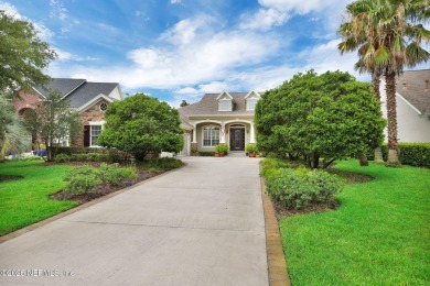 This elegant David Weekley home offers panoramic water views on The Palencia Club in Florida - for sale on GolfHomes.com, golf home, golf lot