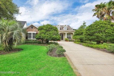 This elegant David Weekley home offers panoramic water views on The Palencia Club in Florida - for sale on GolfHomes.com, golf home, golf lot