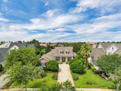 This elegant David Weekley home offers panoramic water views on The Palencia Club in Florida - for sale on GolfHomes.com, golf home, golf lot
