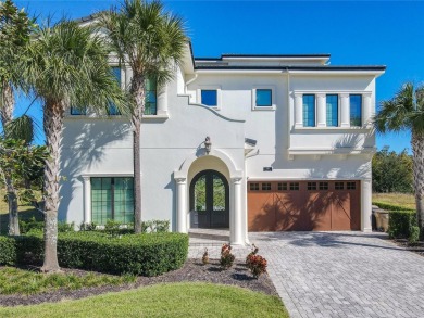 Welcome to 550 Muirfield Loop - The Epitome of Luxury in Reunion on ChampionsGate Golf Resort in Florida - for sale on GolfHomes.com, golf home, golf lot