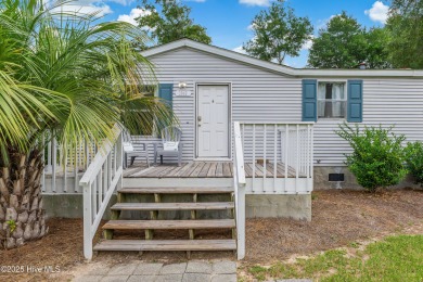 Adorable place at the beach in one of the areas favorite on Brick Landing Plantation Yacht and Golf Club in North Carolina - for sale on GolfHomes.com, golf home, golf lot