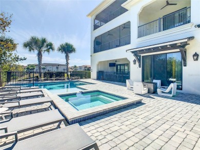 Welcome to 550 Muirfield Loop - The Epitome of Luxury in Reunion on ChampionsGate Golf Resort in Florida - for sale on GolfHomes.com, golf home, golf lot