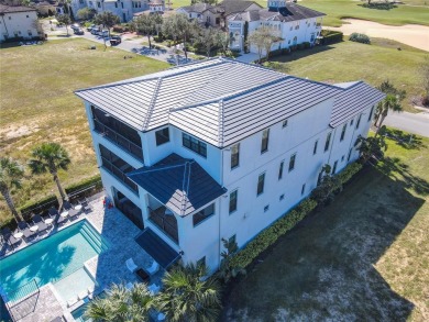 Welcome to 550 Muirfield Loop - The Epitome of Luxury in Reunion on ChampionsGate Golf Resort in Florida - for sale on GolfHomes.com, golf home, golf lot