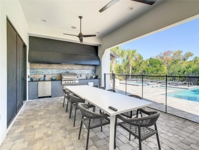 Welcome to 550 Muirfield Loop - The Epitome of Luxury in Reunion on ChampionsGate Golf Resort in Florida - for sale on GolfHomes.com, golf home, golf lot