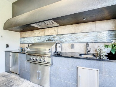 Welcome to 550 Muirfield Loop - The Epitome of Luxury in Reunion on ChampionsGate Golf Resort in Florida - for sale on GolfHomes.com, golf home, golf lot