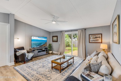 Adorable place at the beach in one of the areas favorite on Brick Landing Plantation Yacht and Golf Club in North Carolina - for sale on GolfHomes.com, golf home, golf lot