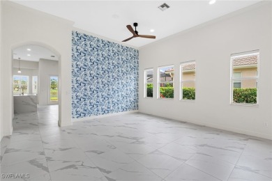 This fully renovated 3-bedroom + den, 2.5-bath residence is the on Valencia Golf and Country Club in Florida - for sale on GolfHomes.com, golf home, golf lot