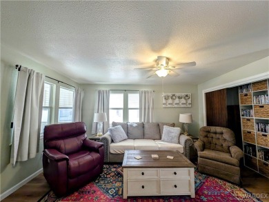 This is a beautiful home. New vinyl plank flooring in family on Riverview Golf Course in Arizona - for sale on GolfHomes.com, golf home, golf lot