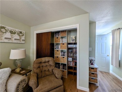 This is a beautiful home. New vinyl plank flooring in family on Riverview Golf Course in Arizona - for sale on GolfHomes.com, golf home, golf lot