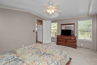 Discover the perfect getaway with this 3 bedroom, 2 bathroom on Rayburn Country Club in Texas - for sale on GolfHomes.com, golf home, golf lot