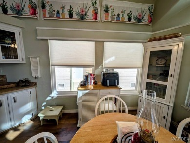 This is a beautiful home. New vinyl plank flooring in family on Riverview Golf Course in Arizona - for sale on GolfHomes.com, golf home, golf lot