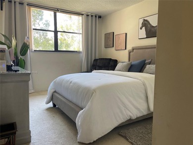 This stunning condo boasts two generously sized master bedrooms on Bonaventure Country Club in Florida - for sale on GolfHomes.com, golf home, golf lot