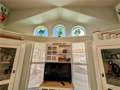 This is a beautiful home. New vinyl plank flooring in family on Riverview Golf Course in Arizona - for sale on GolfHomes.com, golf home, golf lot