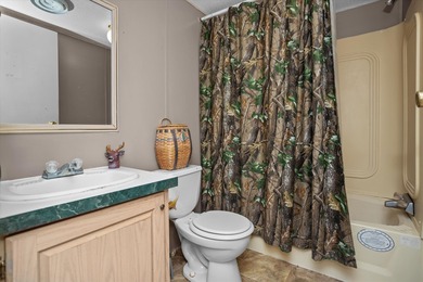 Discover the perfect getaway with this 3 bedroom, 2 bathroom on Rayburn Country Club in Texas - for sale on GolfHomes.com, golf home, golf lot