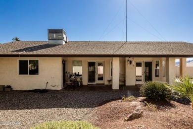 It is a quick golf cart trip down the street to the beautiful on London Bridge Golf Course in Arizona - for sale on GolfHomes.com, golf home, golf lot