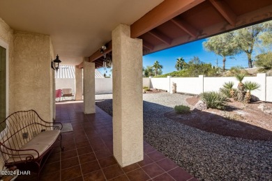 It is a quick golf cart trip down the street to the beautiful on London Bridge Golf Course in Arizona - for sale on GolfHomes.com, golf home, golf lot