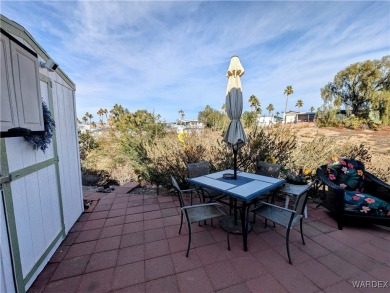 This is a beautiful home. New vinyl plank flooring in family on Riverview Golf Course in Arizona - for sale on GolfHomes.com, golf home, golf lot