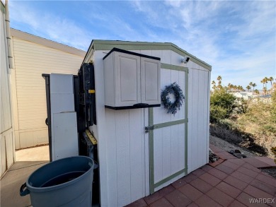 This is a beautiful home. New vinyl plank flooring in family on Riverview Golf Course in Arizona - for sale on GolfHomes.com, golf home, golf lot