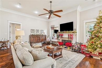 Stunning home with expansive windows overlooking the #3 fairway on Money Hill Golf and Country Club in Louisiana - for sale on GolfHomes.com, golf home, golf lot