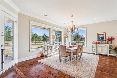 Stunning home with expansive windows overlooking the #3 fairway on Money Hill Golf and Country Club in Louisiana - for sale on GolfHomes.com, golf home, golf lot