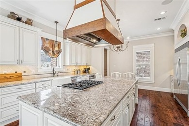 Stunning home with expansive windows overlooking the #3 fairway on Money Hill Golf and Country Club in Louisiana - for sale on GolfHomes.com, golf home, golf lot