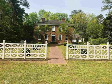 ONE OF GRIFFIN'S FINEST HOMES IS THIS BEAUTIFUL WILLIAMSBURG on The Club at Shoal Creek Golf Course in Georgia - for sale on GolfHomes.com, golf home, golf lot