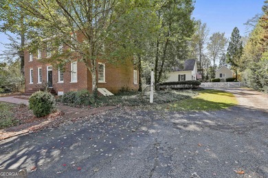 ONE OF GRIFFIN'S FINEST HOMES IS THIS BEAUTIFUL WILLIAMSBURG on The Club at Shoal Creek Golf Course in Georgia - for sale on GolfHomes.com, golf home, golf lot
