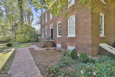 ONE OF GRIFFIN'S FINEST HOMES IS THIS BEAUTIFUL WILLIAMSBURG on The Club at Shoal Creek Golf Course in Georgia - for sale on GolfHomes.com, golf home, golf lot