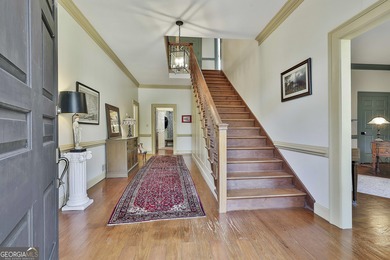 ONE OF GRIFFIN'S FINEST HOMES IS THIS BEAUTIFUL WILLIAMSBURG on The Club at Shoal Creek Golf Course in Georgia - for sale on GolfHomes.com, golf home, golf lot