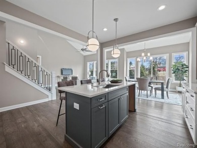 Stunning New Construction End-Unit Condo, adjacent to the on Pine Trace Golf Club in Michigan - for sale on GolfHomes.com, golf home, golf lot