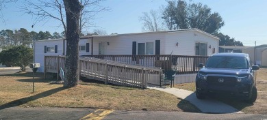 Sit on your deck and watch the boats pass by. Quiet community on Barefoot Resort and Golf Club  in South Carolina - for sale on GolfHomes.com, golf home, golf lot