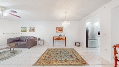 Step into this spacious first-floor unit in the highly on Flamingo Lakes Country Club in Florida - for sale on GolfHomes.com, golf home, golf lot