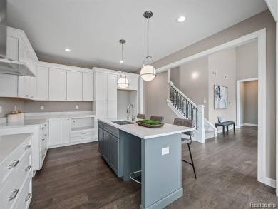 Stunning New Construction End-Unit Condo, adjacent to the on Pine Trace Golf Club in Michigan - for sale on GolfHomes.com, golf home, golf lot