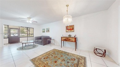 Step into this spacious first-floor unit in the highly on Flamingo Lakes Country Club in Florida - for sale on GolfHomes.com, golf home, golf lot
