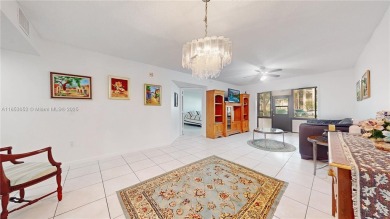 Step into this spacious first-floor unit in the highly on Flamingo Lakes Country Club in Florida - for sale on GolfHomes.com, golf home, golf lot