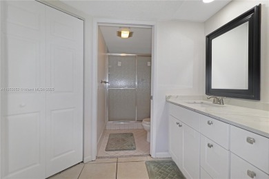Step into this spacious first-floor unit in the highly on Flamingo Lakes Country Club in Florida - for sale on GolfHomes.com, golf home, golf lot